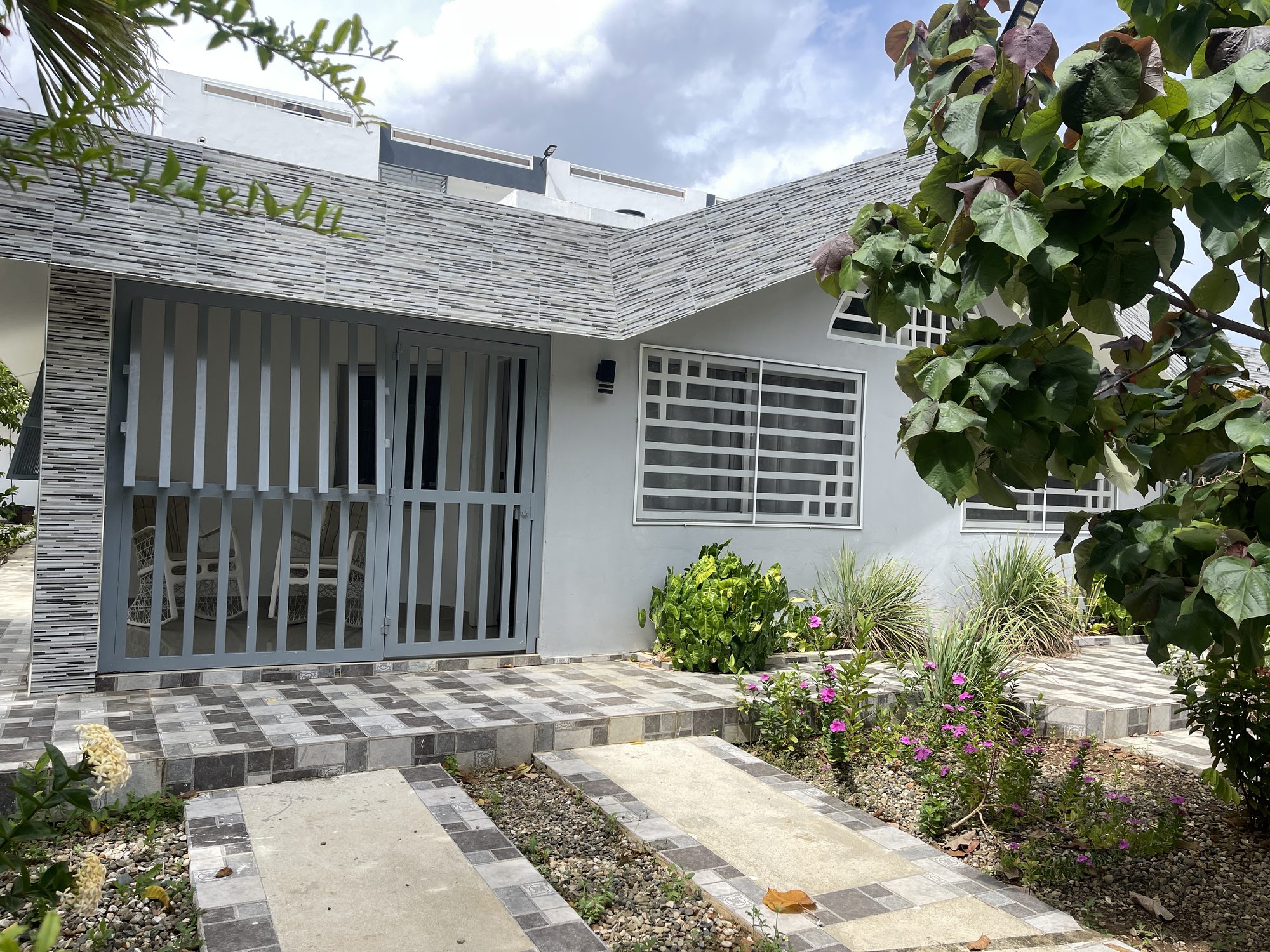 The front of the casita and the garden path