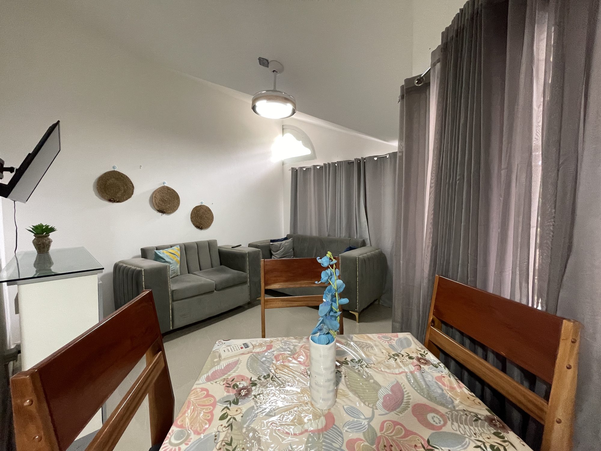 The living room, with the dining table in front of it