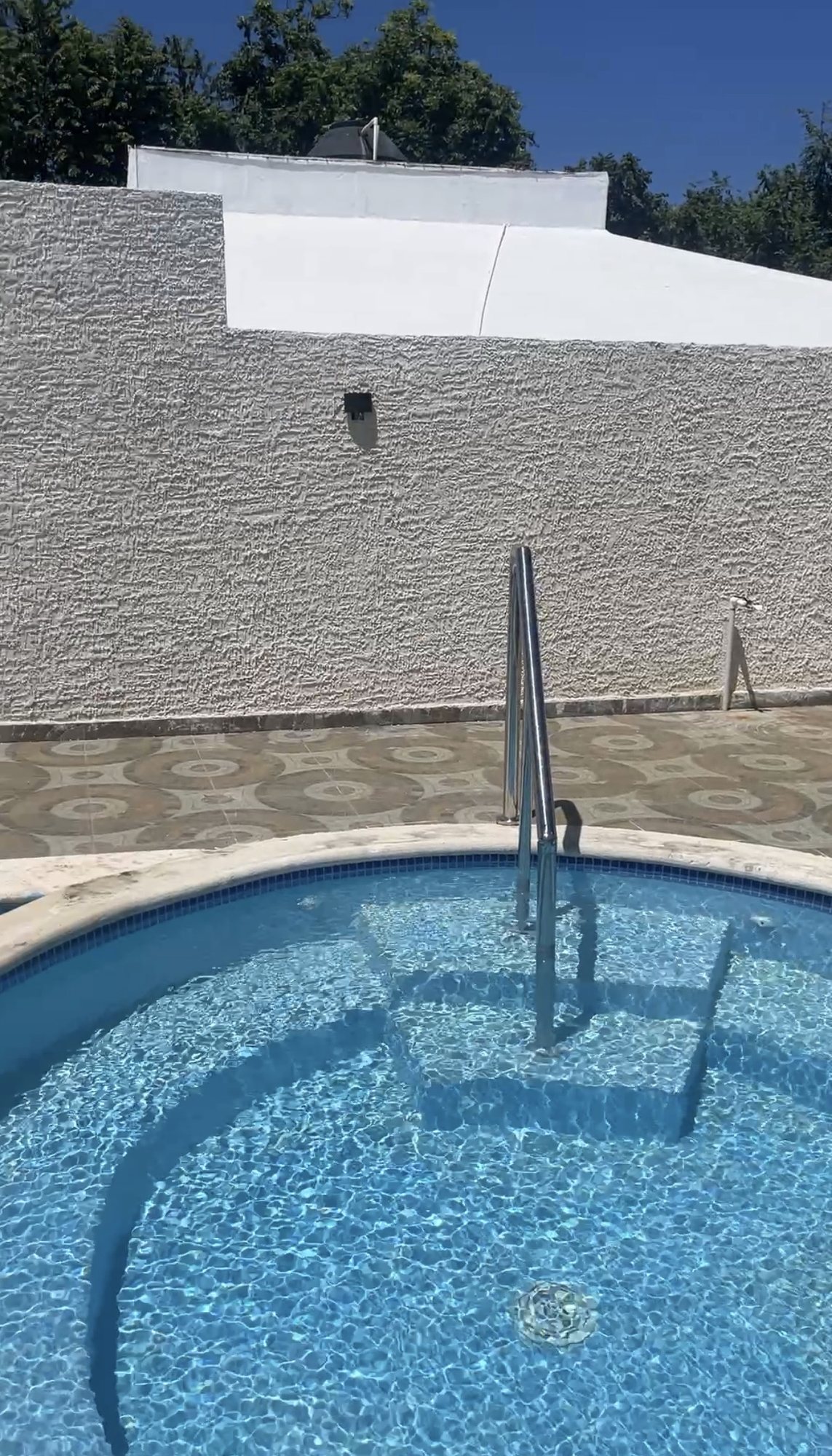 The steps down into the pool